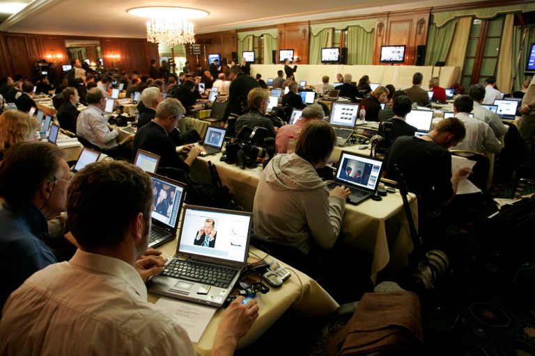 journalists at press conference