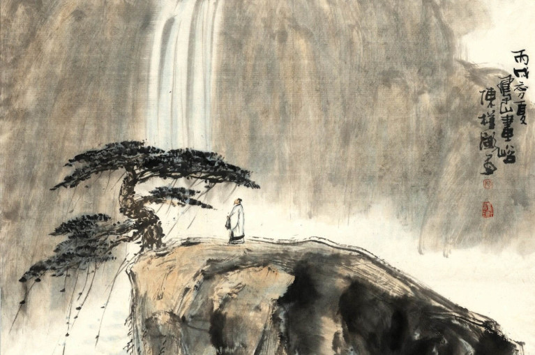 Sage in front of waterfall