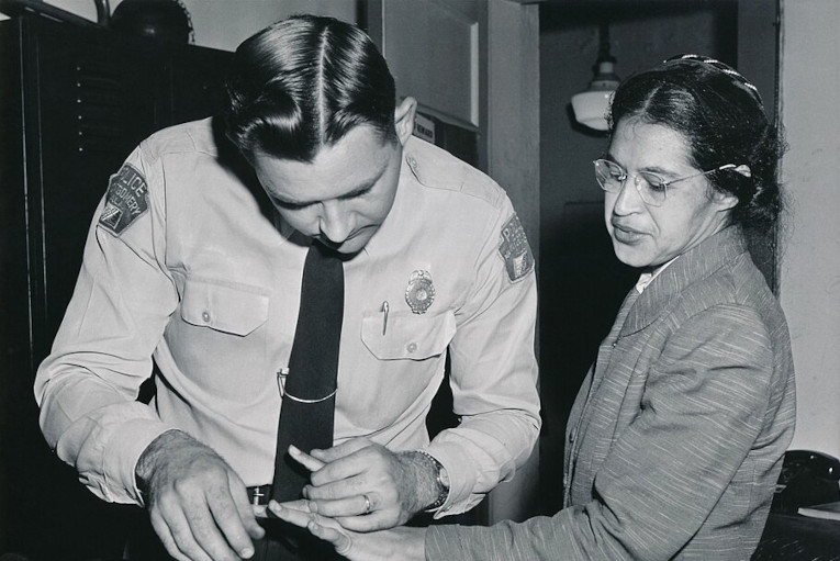 Rosa Parks being fingerprinted after bus protest